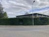 cut hedge on an industrial park